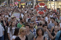 Rakúski demonštranti pochodujú na podporu utečenco